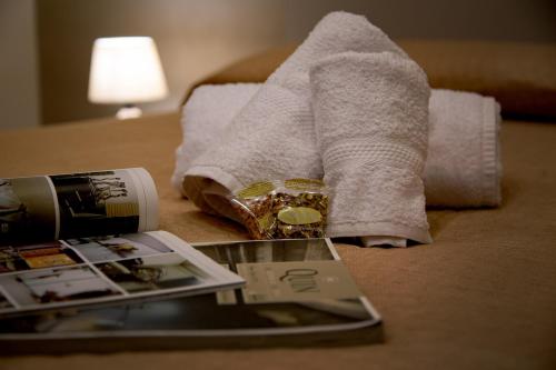 Cama o camas de una habitación en Fiore dei Templi - luxury suite experience