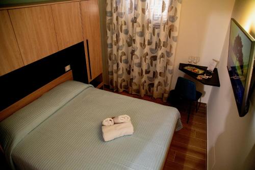Cama o camas de una habitación en Fiore dei Templi - luxury suite experience