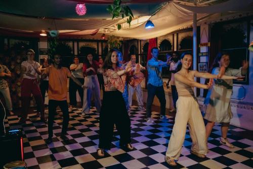 a group of people dancing on a dance floor at Dreamyard Udaipur in Udaipur