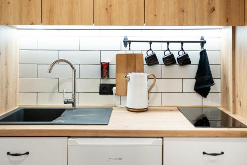 Bedthoven lofts you! Self Check-in & Parkingにあるキッチンまたは簡易キッチン