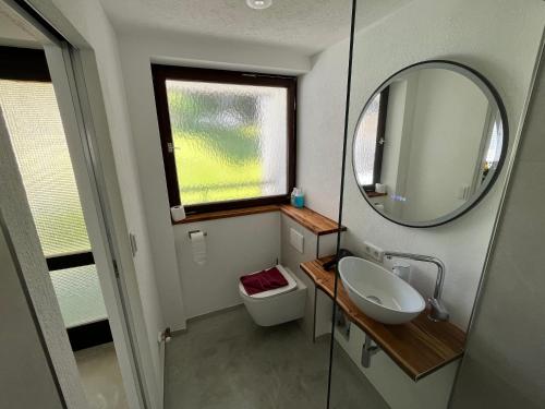 ห้องน้ำของ Ferienwohnung im herzen von Oberstaufen
