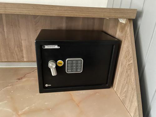 a black box with a remote control in a drawer at Studio Rm Vâlcea in Râmnicu Vâlcea