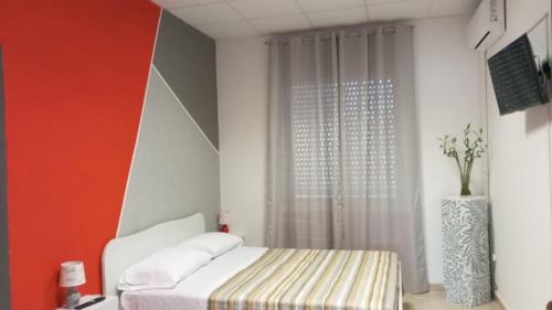 Postel nebo postele na pokoji v ubytování B&B La Stazione