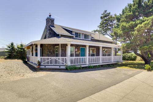 a large white house with a white porch at Coastal Lincoln City Home with Spacious Deck! in Lincoln City