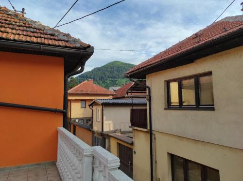 a view from the balcony of a town with buildings at City Center Stay in Visoko