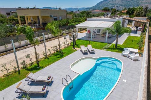 an image of a swimming pool at a villa at Villa DellaTerra in Alcamo