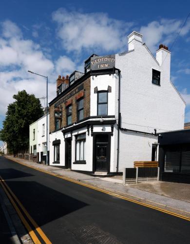a white building on the side of a street at The Bedford Inn in Ramsgate