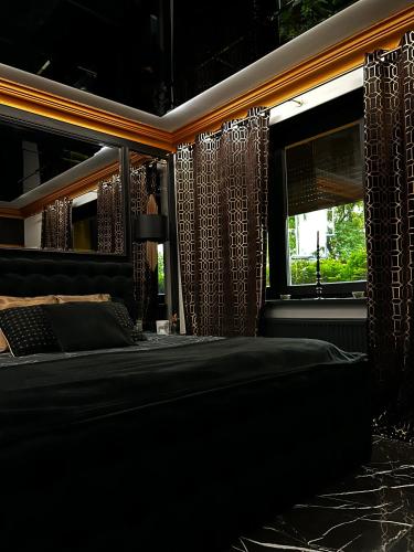 Postelja oz. postelje v sobi nastanitve LuxuryApartments