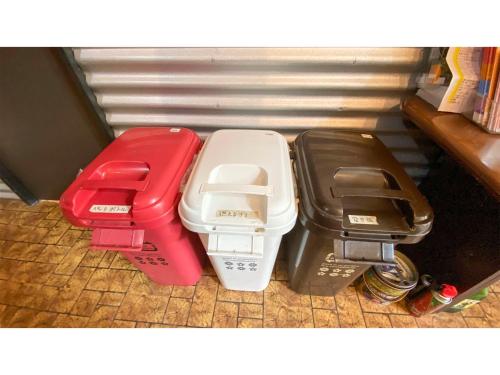three different colored containers sitting on the floor at Forte "Hachijojima" - Vacation STAY 62479v in Hachijo