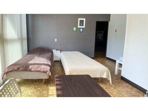 מיטה או מיטות בחדר ב-Forte "Hachijojima" - Vacation STAY 62454v