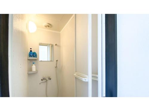a bathroom with a shower and a mirror at Forte "Hachijojima" - Vacation STAY 62454v in Hachijo