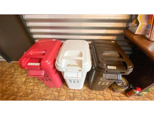 three different colored containers sitting on the floor at Forte "Hachijojima" - Vacation STAY 62466v in Hachijo