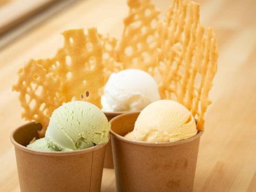 threeoops of ice cream in paper cups on a table at Iseebiso - Vacation STAY 69512v in Ei