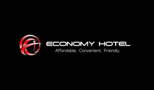 un logo pour un hôtel économique sur fond noir dans l'établissement Economy Hotel Marietta, à Marietta