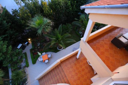 an overhead view of a house with a table on a roof at Villa Jelena in Zadar