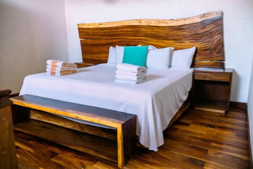 Postel nebo postele na pokoji v ubytování Hotel de Asis