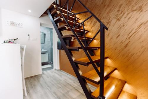 a staircase in a house with wooden floors at Aria in Cetinje