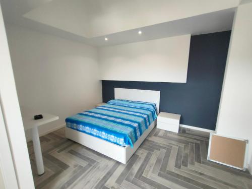 En eller flere senge i et værelse på Stanza idromassaggio 2