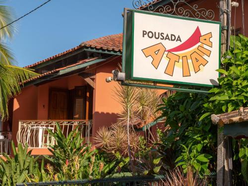 a sign for a puebla fire in front of a house at Pousada Atiaia in Ilhabela