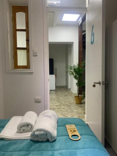 Postel nebo postele na pokoji v ubytování Casona Gorbea Hotel