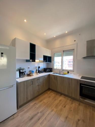 A kitchen or kitchenette at Menta House