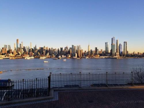 a view of the city from the river at Wonderful & Cozy Apartment Close to Time Square NYC in North Bergen