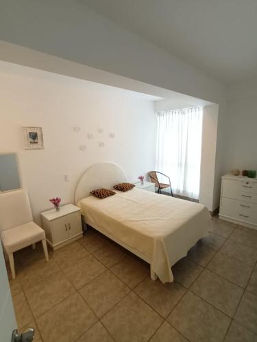 Кровать или кровати в номере Excelente departamento con vista al Mar - Punta Hermosa