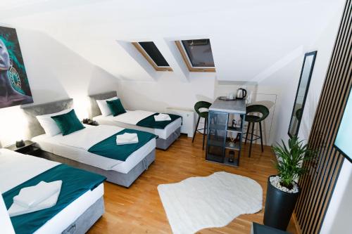 Ένα ή περισσότερα κρεβάτια σε δωμάτιο στο Mini Hotel RiverLux Apartments