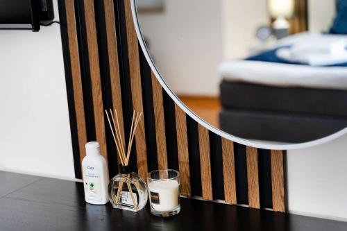 Ένα ή περισσότερα κρεβάτια σε δωμάτιο στο Mini Hotel RiverLux Apartments