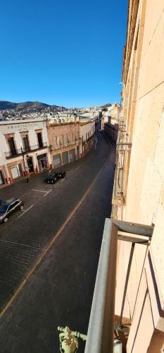 a view of an empty street from a building at HOTEL POSADA DE LA MONEDA in Zacatecas