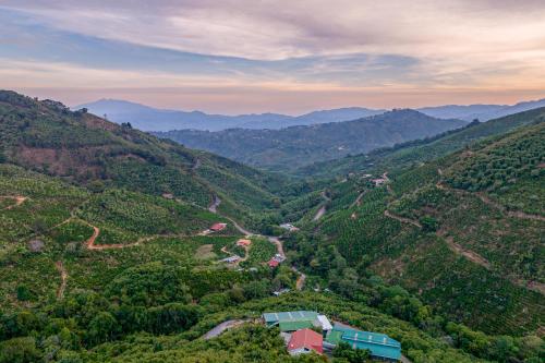 an aerial view of a valley with mountains at El Portal Tarrazu in Santa Cruz