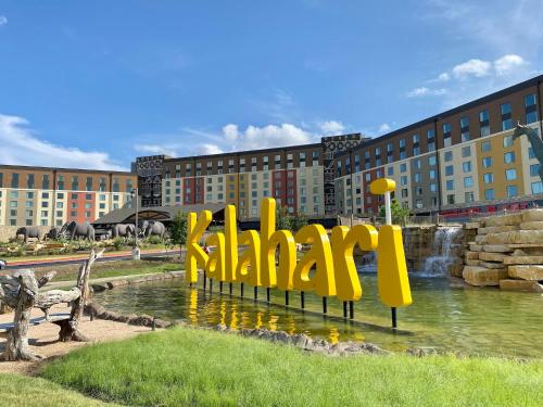a large yellow sign in front of a building at WOW!! Ultimate Pocono Retreat, Hot Tub, Game Room, Deck, Lakes, Skiing, Pools in Long Pond