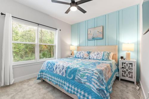 a bedroom with a bed and a window at Serenity Pearl Escape in Saint Augustine