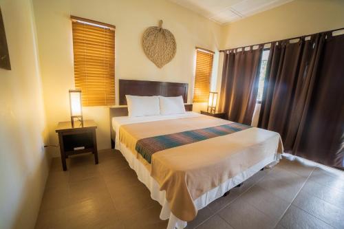 Una cama o camas en una habitación de Kasagpan