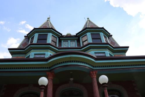 a building with a turret on top of it at VAAST Bed & Breakfast in Adamstown