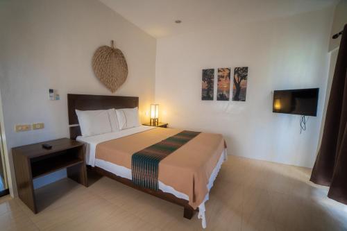 Una cama o camas en una habitación de Kasagpan