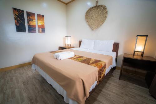 Una cama o camas en una habitación de Kasagpan