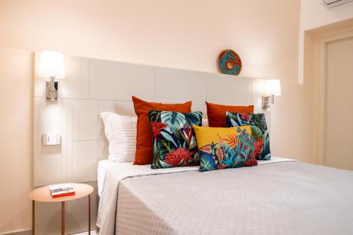 Postel nebo postele na pokoji v ubytování Magnini Rooms