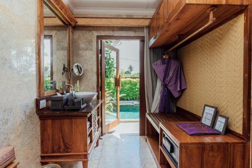 Fotografie z fotogalerie ubytování Desa Swan Villas & SPA, Keramas v destinaci Keramas