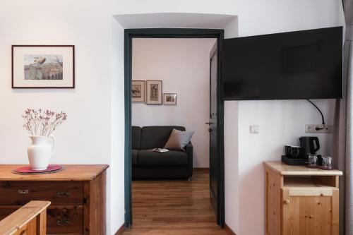 Kuchyň nebo kuchyňský kout v ubytování Hotel Dolomitenhof & Chalet Alte Post
