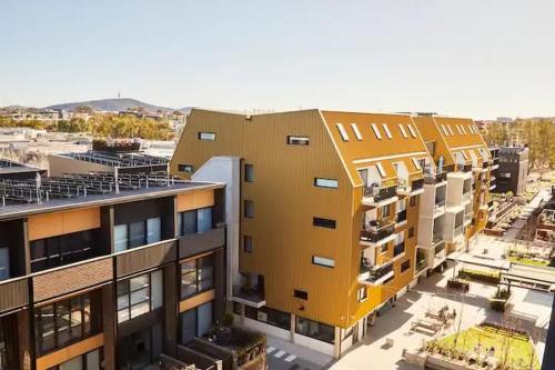 an overhead view of an apartment complex with buildings at Kingston Foreshore-Kingsborough in Kingston 