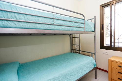 Posteľ alebo postele v izbe v ubytovaní AT007 Apartamento a 150 m de la playa