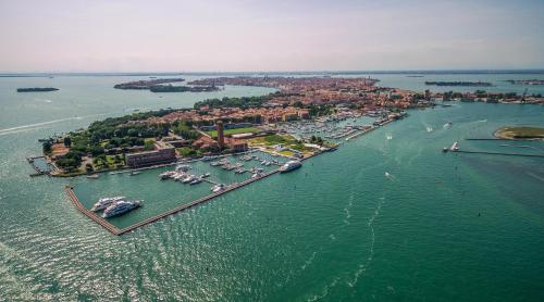 an aerial view of a harbor with boats in the water at Hotel & Residence Venezia 2000 in Venice-Lido