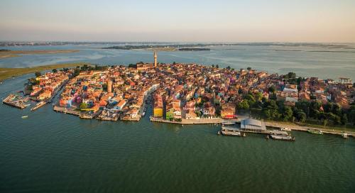 an aerial view of a city on the water at Hotel & Residence Venezia 2000 in Venice-Lido