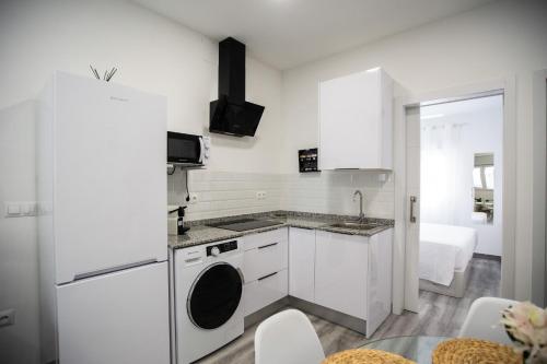 Кухня или мини-кухня в Apartamentos Linersol
