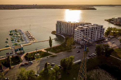 an aerial view of a building next to the water at The 502 Mamaia in Mamaia