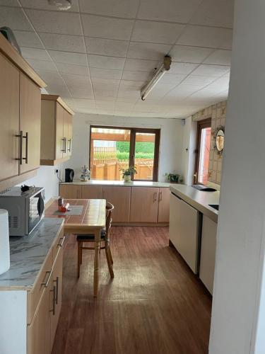 A kitchen or kitchenette at Home in Monkstown