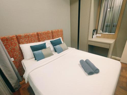 מיטה או מיטות בחדר ב-Vista Genting Premium 3bedrooms 8pax Free WiFi No Deposit