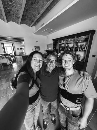 a group of three people posing for a picture at Agriturismo Masseria Cannella in Lesina