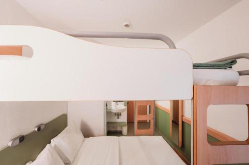 Cama o camas de una habitación en MIA HOTELS Tanger